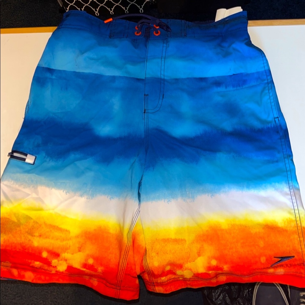 Speedo brand swim trunks, 3 pockets, SPF protection with tags on